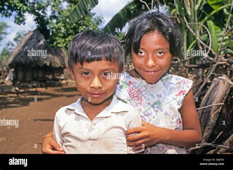 Two Young Mayan Children A Brother And Sister In A Tiny Jungle