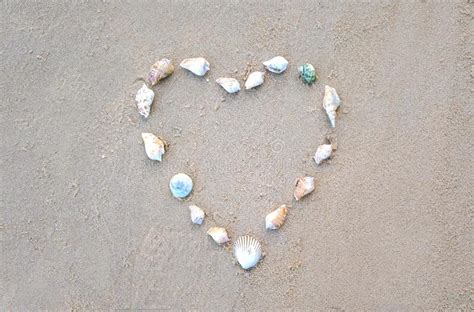 A Heart Made Of Shells On The Sand Stock Photo Image Of Pattern