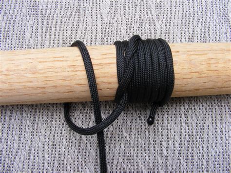 Use wax on your paracord to make the grip last longer, more resistant to the elements as sweat as well as adding friction. Make A Hiking Stick Paracord Wrap