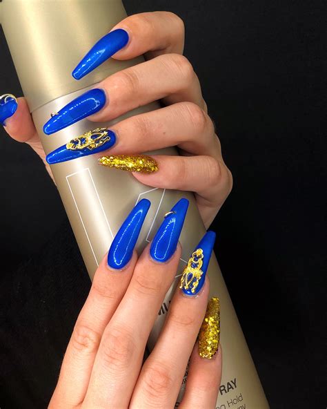 Royal Blue Nails With Gold Design Talk