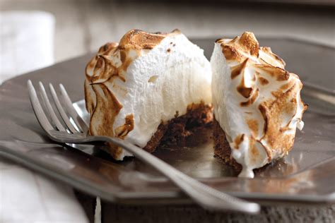 Everyone was amazed that the baked alaska didn't melt and was very tasty. Individual Baked Alaska - Victoria Magazine