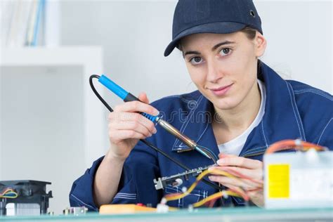 Female Technician Using Soldering Iron Stock Photo Image Of Support