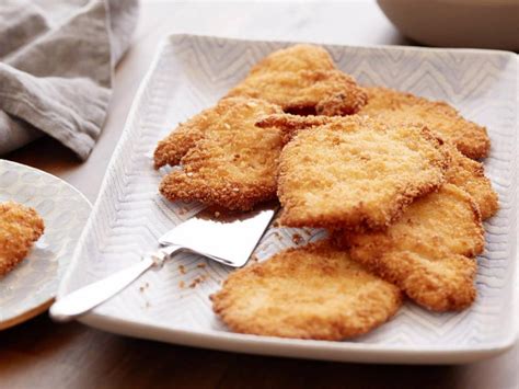 Working with 1 chicken breast at a time, dredge in flour, shaking off excess, dip into egg mixture, turning to. Chicken Schnitzels Recipe | Food Network