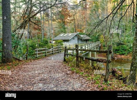 Footbridge Over The Linville River Leading To The Linville Falls