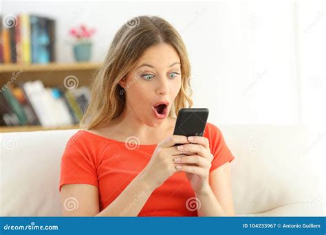 Surprised Girl Watching Smart Phone Content Stock Image Image Of