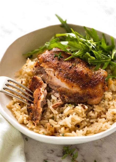 The nation's sweetheart is back with a brand new cookbook and tv series sharing her favourite easy and delicious family recipes for all occasions. Oven Baked Chicken and Rice | RecipeTin Eats