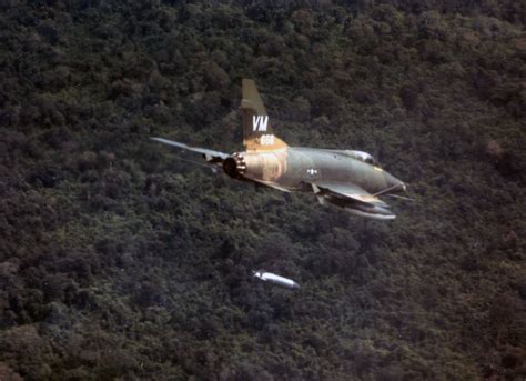 A F 100d Aircraft Dropping A Napalm Bomb Near Bien Hoa South Vietnam