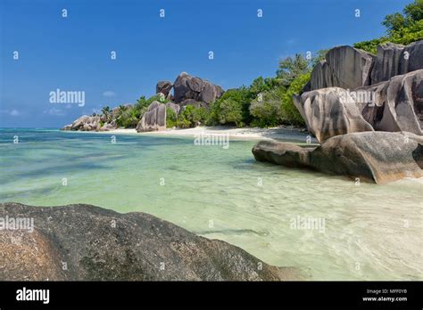 Anse Source Dargent Granite Rocks At Beautiful Beach On Tropical