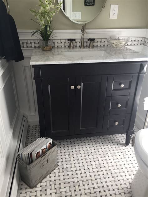Beautiful Black Vanity With Marble Top And Grey White Marble Flooring