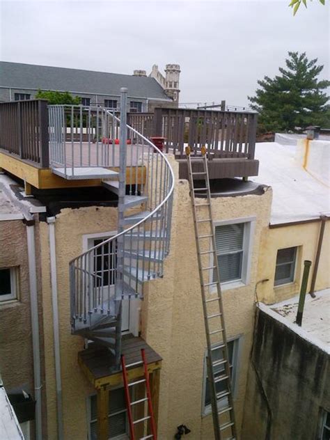 No more worrying that your foot might slip on a wet ladder rung. spiral stairs — Cumming Construction