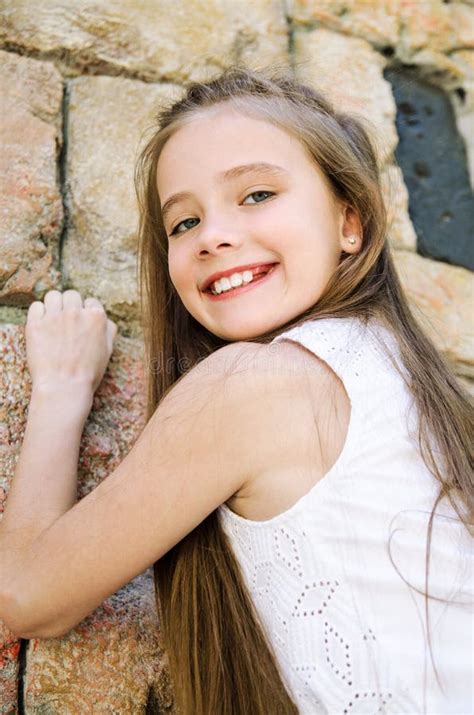 Portrait Of Adorable Smiling Little Girl Child Schoolgirl Teenager