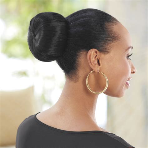 Thread your ponytail through the donut. Bri Bun | Cool hairstyles, Donut bun, Big hair