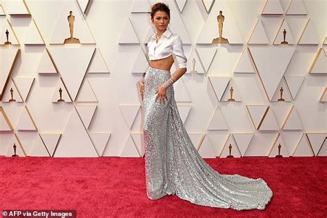 Zendaya Puts On A Dazzling Display As She Showcases Her Abs In Silky Crop Top And Silver Sequin