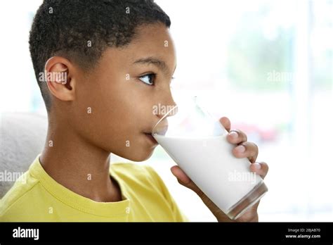 African American Boy Drinking Milk Closeup Stock Photo Alamy