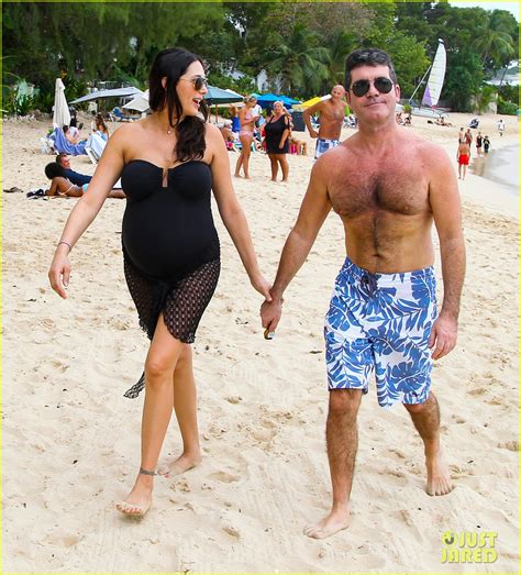 full sized photo of simon cowell shirtless beach stroll with pregnant girlfriend lauren