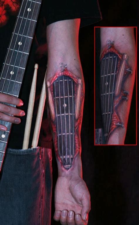 A guitar tattoo is an often tattoo choice by many musicians. Sick, SICK, 3D Guitar arm tattoo. | Tattoos | Pinterest