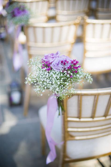 Your walk down the aisle should be memorable and special. Purple and White Aisle Decorations on Gold Chiavari Chairs ...