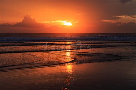 Dramatic Sunset In Kuta Beach Bali Indonesia Stock Photo Image Of