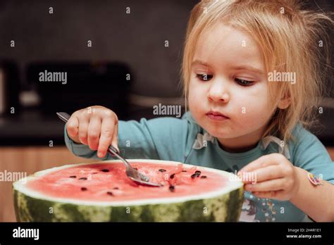 Kid Eating Watermelon Stock Photo Alamy