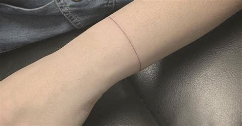 Fine Line Minimalist Wristband Tattoo