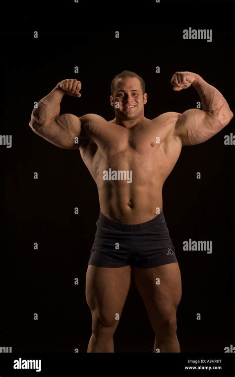 Young Bodybuilder Showing His Muscles Stock Photo Alamy