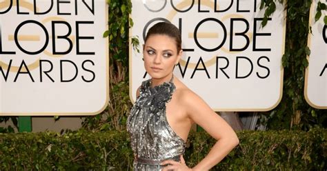 Mila Kunis In A Metallic Halter Neck Gucci Premiere Gown At The 2014