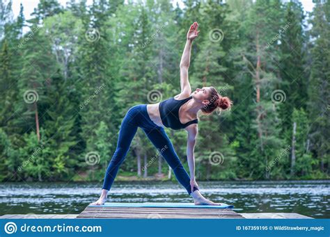 Yogi Girl Practicing Yoga Doing Utthita Trikonasana Exercise Extended