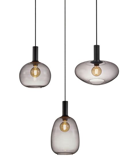 The marojales ceiling light by eglo makes a statement in any space with the two smoked glass ball shades sitting atop and below the sleek matte black arms. Organic design smoked glass light pendants - 3 styles with ...