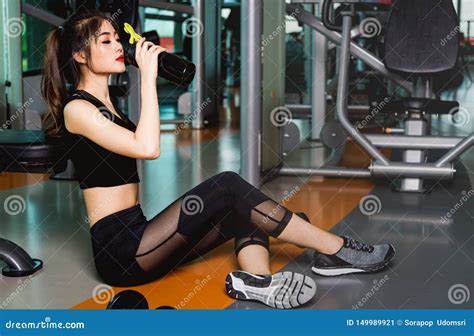 Woman Drinking Water On Bottle After Workout Exercise Stock Image