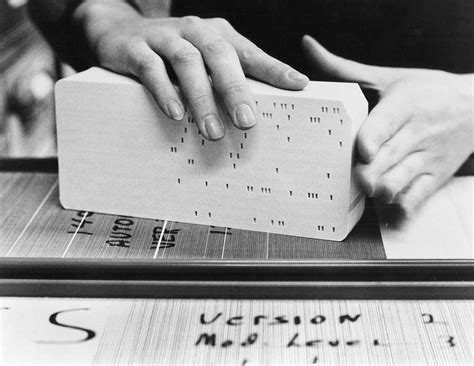 As disk drives were introduced, a limited amount of program and data set storage could be cached, which would be much faster. punch card | Computacion, Holocausto, Noche