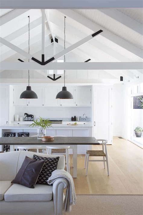Step 2 of lighting a room with high ceilings is to create a layer of light by adding pendant lights or chandeliers. 30 Stunning interior living spaces with exposed ceiling ...