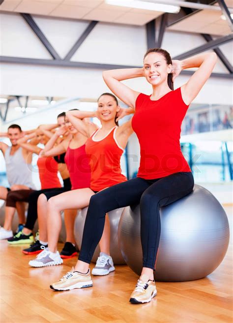 Group Of People Working Out In Pilates Class Stock Image Colourbox
