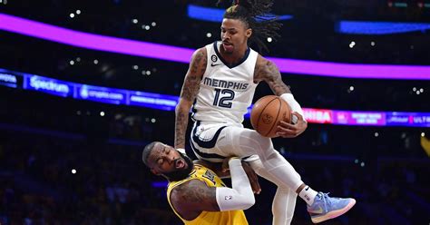 Nba The Incredible Photo Of Ja Morant Sitting In The Air On Lebron