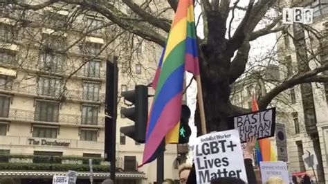 crowds protest against brunei anti gay laws outside dorchester hotel lbc
