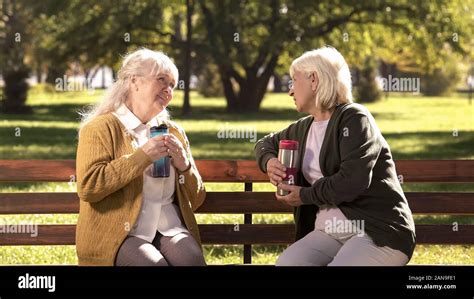 Old Ladies Sitting On Park Bench Hi Res Stock Photography And Images