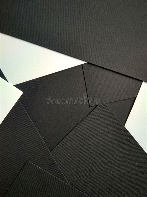 Few Black Papers Folded With Color Paper Close Up Stock Image Image