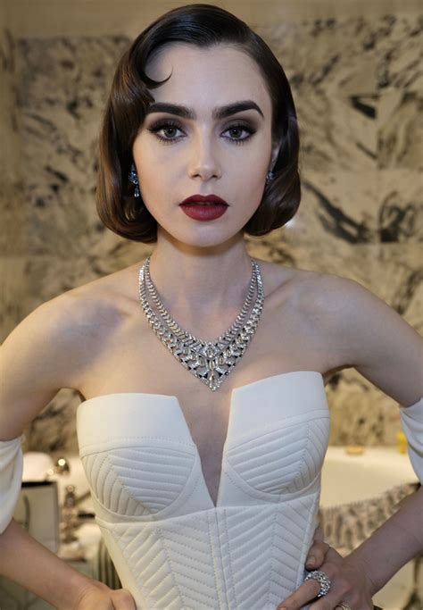 lily collins paired a chic bob with old hollywood glam at the met gala fashnfly