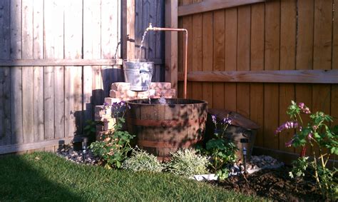 This fountain is easy to build and will make your landscape pop. | Water fountains outdoor, Barrel fountain, Whiskey barrel ...