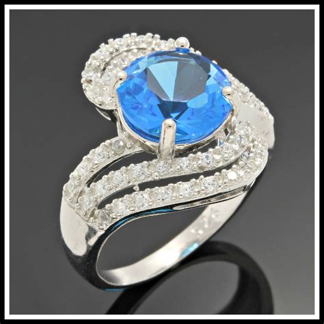 522ctw Genuine Blue Topaz And White Sapphire 925 Sterling Silver Ring