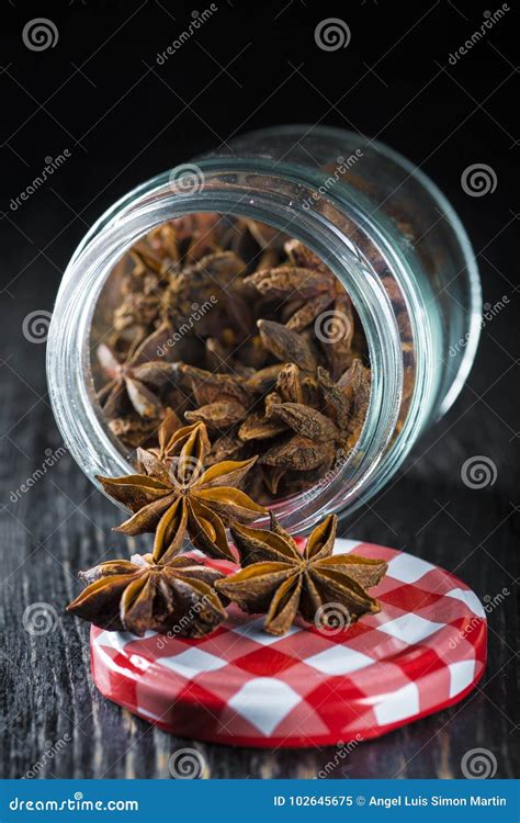 A Glass Jar With Star Anise Seeds Stock Image Image Of Background