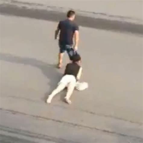 Horrifying Video Shows Woman Dragged By Hair Across Road But Is It A