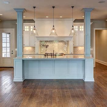 I actually think that the space in the center area is kind of wasted. pillars in island | Kitchen island ideas with columns ...