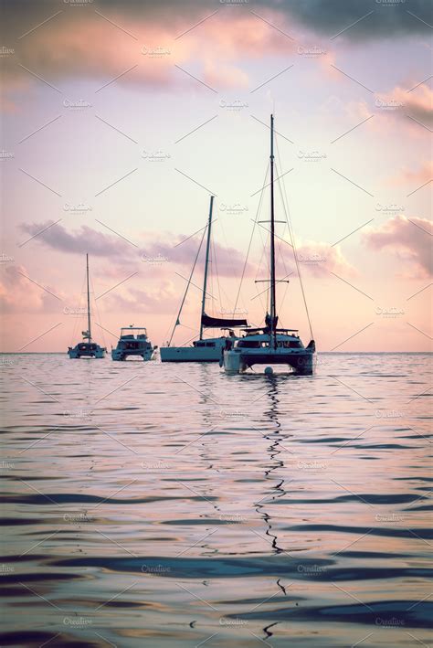 Beautiful Sunset Featuring Yacht Sailboat And Ship High Quality