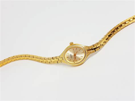 Luxury Bulova Quartz Watch Gold Womens Caravelle Elegant Watch