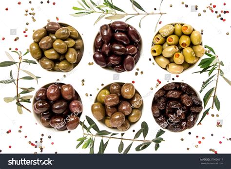 6 Different Types Of Olives In White Cups Framed By Olive
