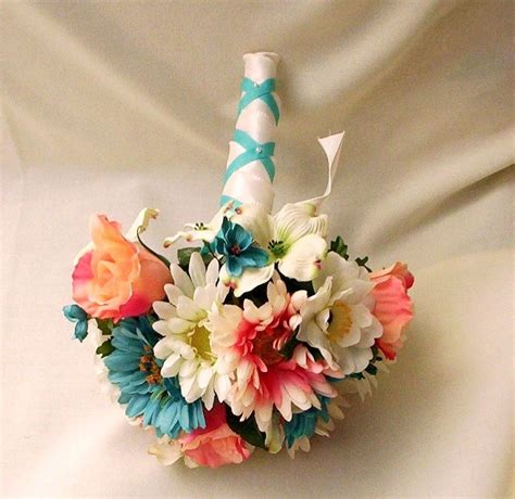 Roses, carnations, hydrangeas, peonies, greenery, orhids, lilies i like the coral and blue in this,,,looks pretty and ...