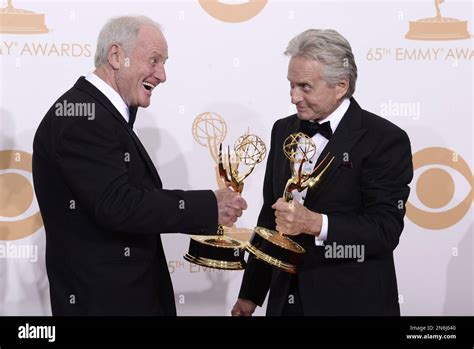 From Left Producer Jerry Weintraub And Actor Michael Douglas Pose