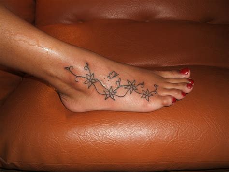 See more ideas about tattoos, butterfly tattoo, butterfly tattoo designs. Flower Tattoos On Foot ~ info