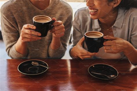 Two Friends Having Coffee Together High Quality People Images