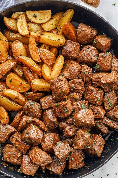 Skip the steakhouse and make this succulent garlic and herb butter steak at home. Garlic Butter Steak Bites and Potatoes in 2020 (With ...